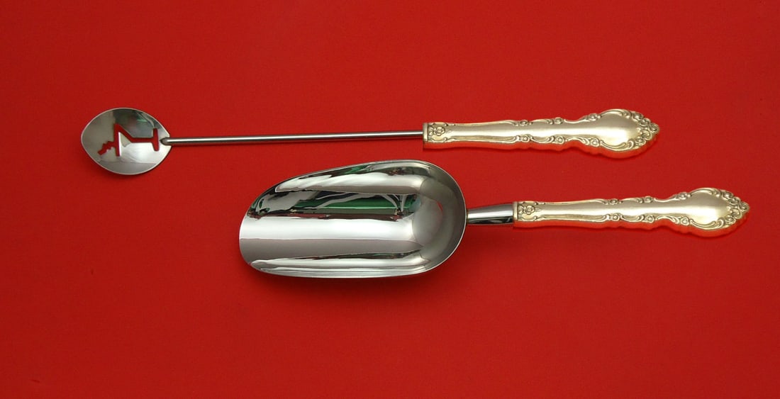 Oneida Grandeur Sterling Silver Custom Bar Set 2pc Martini Spoon Ice Scoop: Oneida Grandeur Sterling Silver Custom Bar Set 2pc Martini Spoon Ice Scoop Enhance your entertaining experience with this exquisite Grandeur by Oneida Sterling Silver Bar Set. This two-piece hostess s