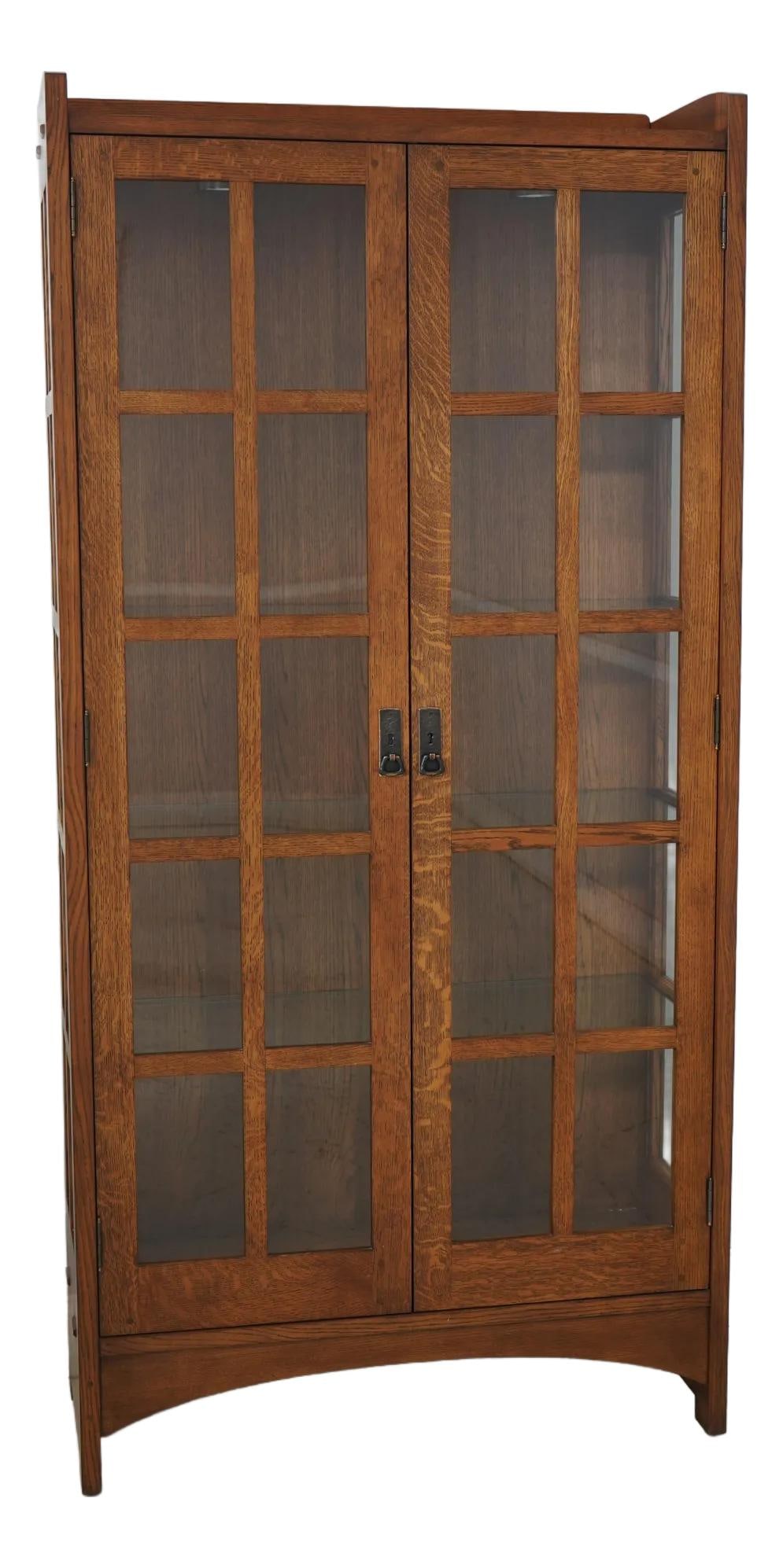 Stickley Mission Oak Lighted 2 Door Bookcase with Adjustable Shelves: Stickley Mission Oak Lighted 2 Door Bookcase with Adjustable Shelves This Stickley Mission Oak 2 Door Cabinet Bookcase, approximately 20 years old, features adjustable shelves and a lighted interior,