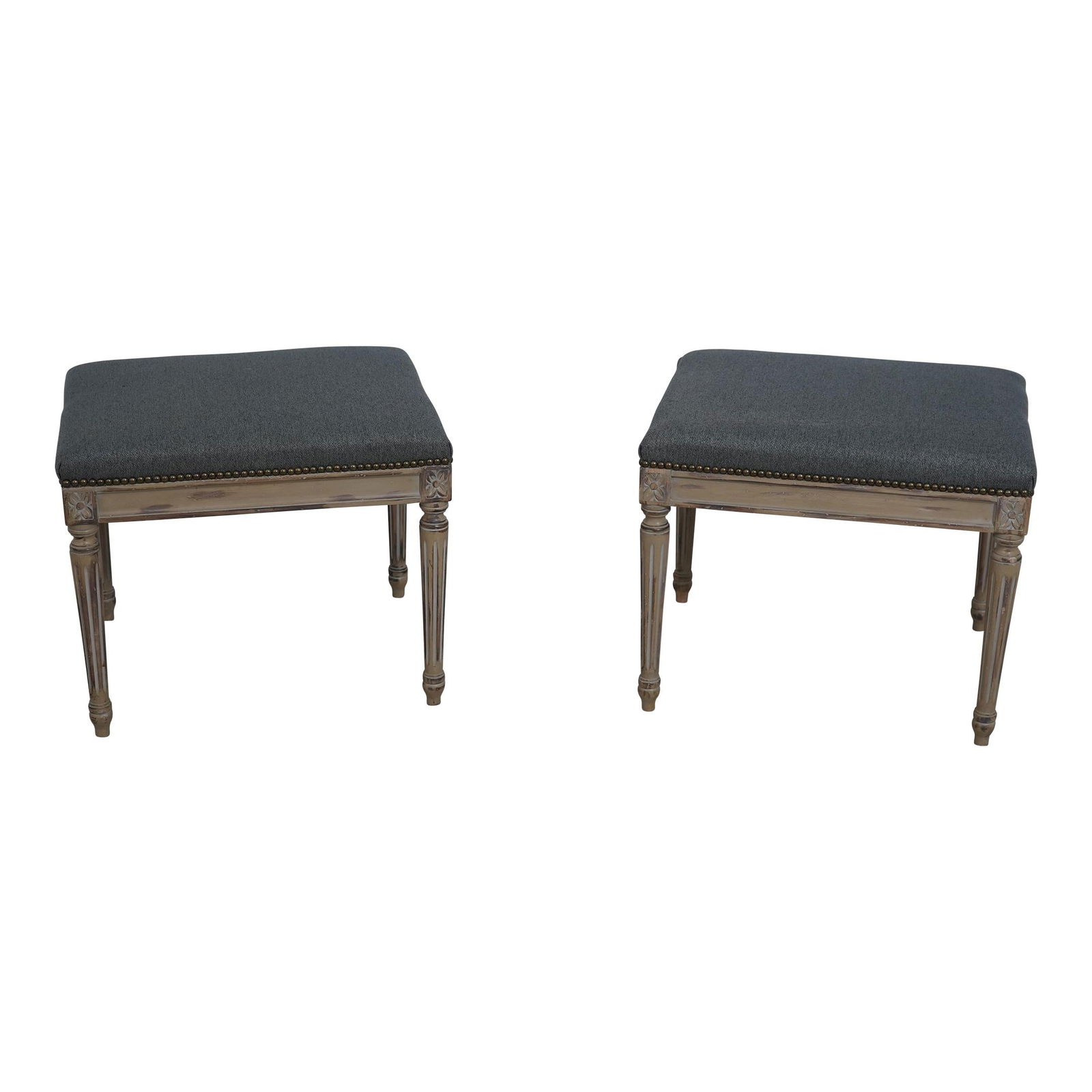 Elegant Pair of 1930s Louis XVI Vintage Stools in White Wood: Elegant Pair of 1930s Louis XVI Vintage Stools in White Wood This elegant pair of vintage stools or ottomans, crafted in the Louis XVI style, dates back to the 1930s and is possibly of French origin.