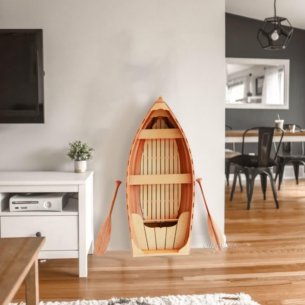 5-Foot Whitehall Dinghy Display Model: 5-Foot Whitehall Dinghy Display Model This stunning 5-foot Whitehall dinghy is perfect for display, showcasing its classic design and craftsmanship. Measuring 14.50 inches in height, 62 inches in widt