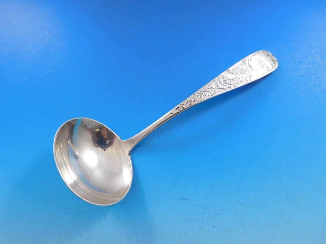 Vintage Brite-Cut Sterling Silver Gravy Ladle 6.25 Inch Monogrammed: Vintage Brite-Cut Sterling Silver Gravy Ladle 6.25 Inch Monogrammed This vintage Brite-Cut gravy ladle is crafted from high-quality sterling silver and measures 6 1/4 inches in length. With its elegan