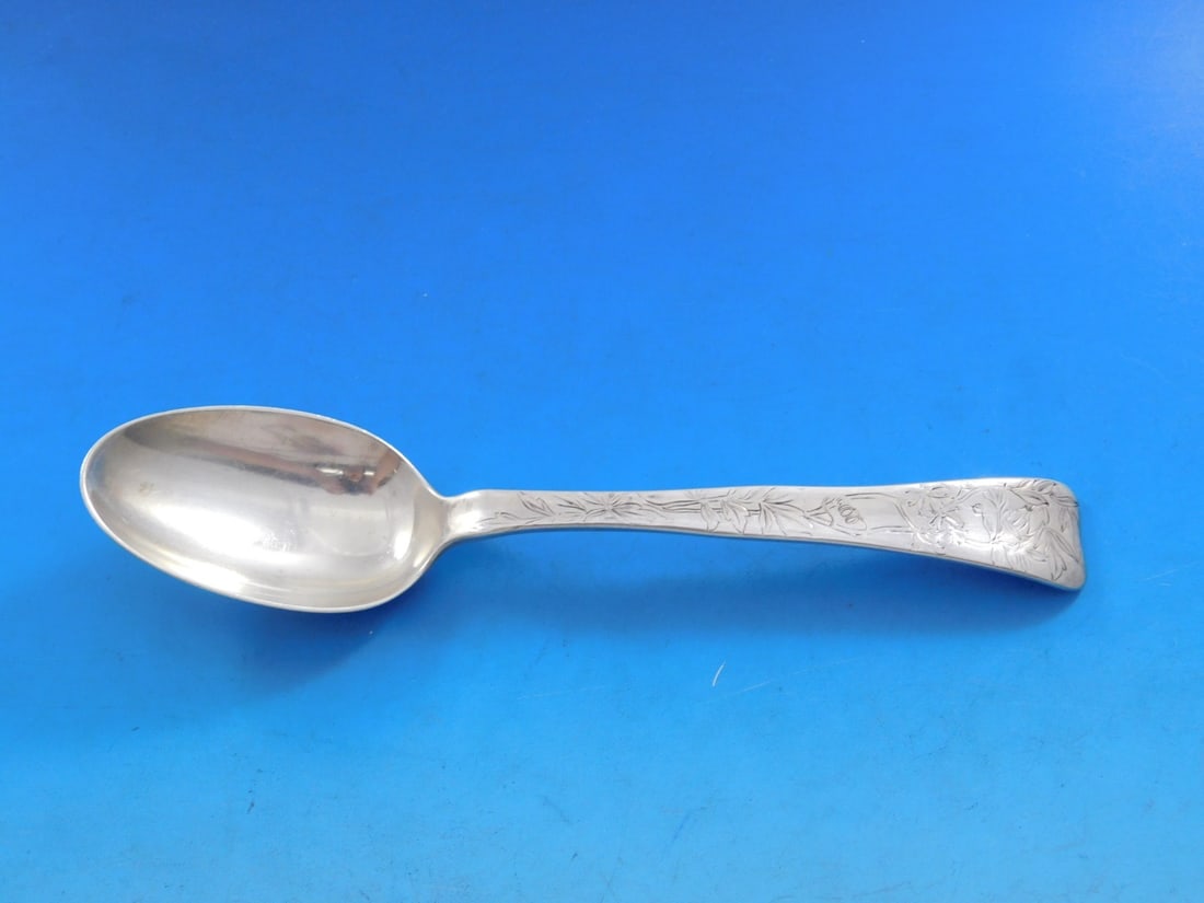 Tiffany & Co. Sterling Silver Lap Over Edge Soup Spoon 7": Tiffany & Co. Sterling Silver Lap Over Edge Soup Spoon 7" This exquisite place soup spoon, crafted by Tiffany & Co., features the elegant Lap Over Edge pattern with intricate acid-etched leaves. Measu