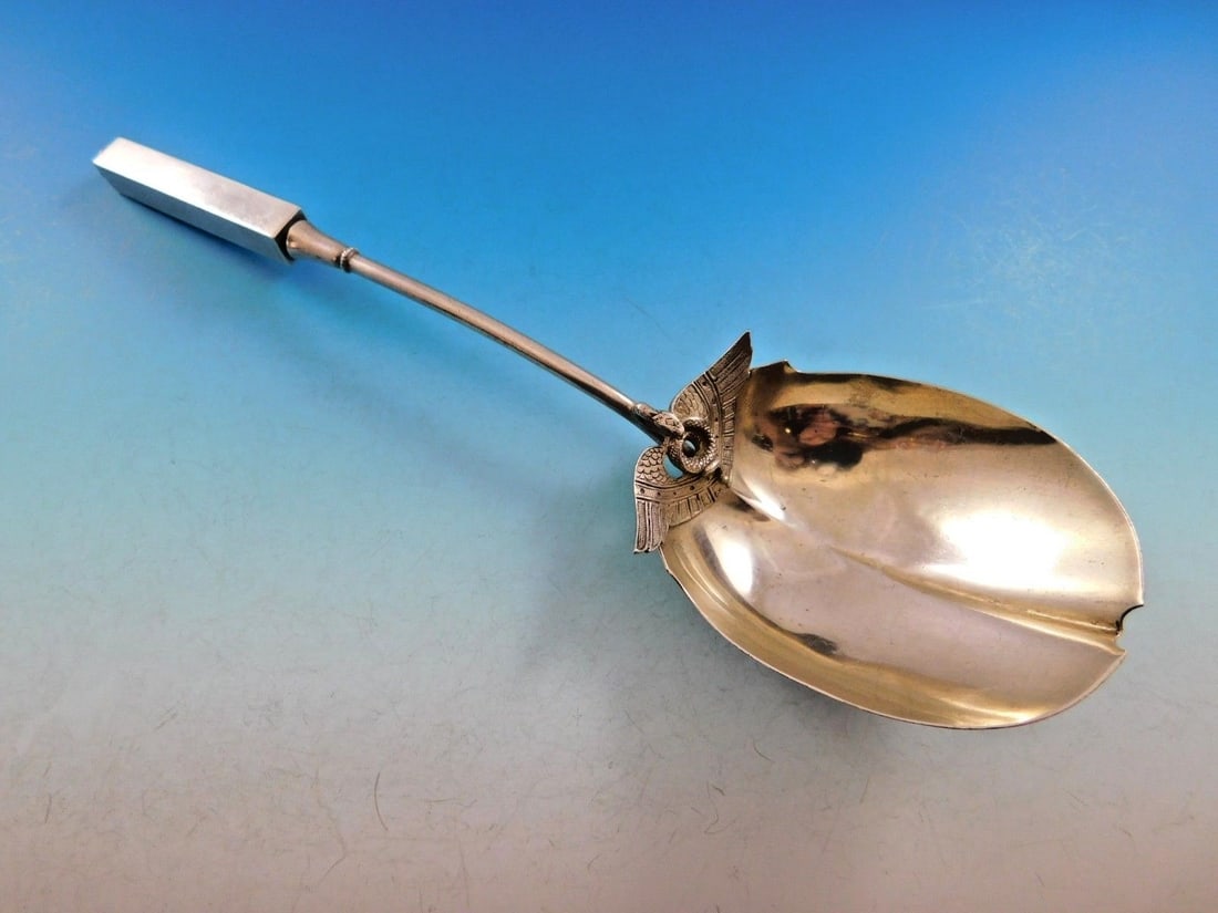 Gorham Isis Sterling Silver Berry Spoon 10 Inch Egyptian Revival: Gorham Isis Sterling Silver Berry Spoon 10 Inch Egyptian Revival This remarkable 10" berry spoon, part of the Isis pattern by Gorham, is a stunning example of Egyptian Revival design. Crafted from hig