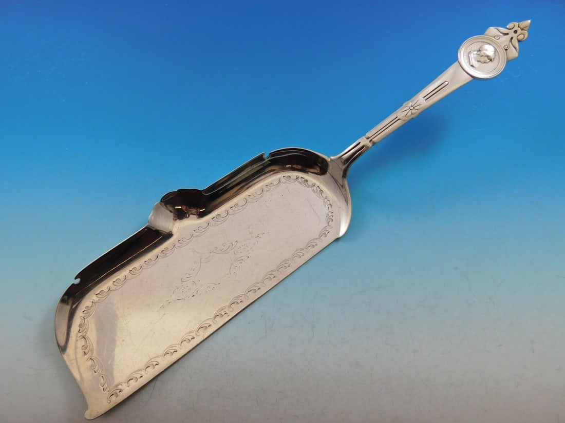 Gorham Sterling Silver Medallion Pattern Crumber 11 3/4 Retailed by Tiffany: Gorham Sterling Silver Medallion Pattern Crumber 11 3/4 Retailed by Tiffany This sterling silver crumber features the Medallion pattern by Gorham and measures 11 3/4 inches in length. It was retailed