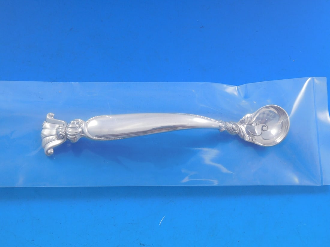 Wallace Sterling Silver Romance of the Sea Mustard Ladle 4 5/8 Custom Made: Wallace Sterling Silver Romance of the Sea Mustard Ladle 4 5/8 Custom Made This exquisite mustard ladle, crafted by Wallace in the elegant Romance of the Sea pattern, showcases timeless beauty and fun