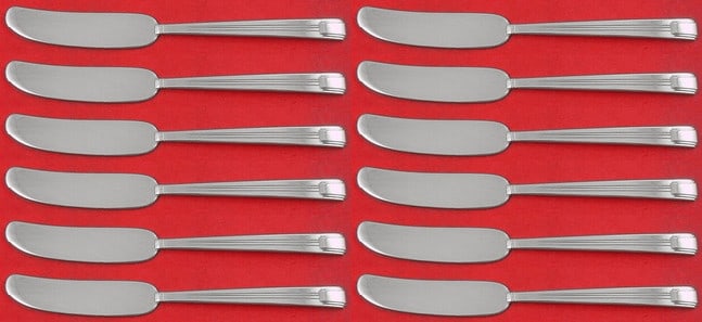 Tiffany & Co Century Sterling Silver Butter Spreader Set of 12 6 1/8": Tiffany & Co Century Sterling Silver Butter Spreader Set of 12 6 1/8" This exquisite set of 12 butter spreaders from Tiffany & Co. features the elegant Century pattern, crafted from high-quality sterl