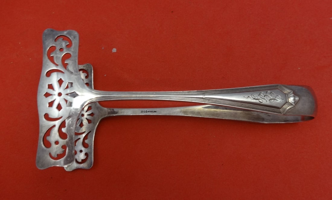 Gorham Plymouth Sterling Silver 5 Inch Toast Tong Pierced Serving Piece: Gorham Plymouth Sterling Silver 5 Inch Toast Tong Pierced Serving Piece This Plymouth by Gorham Sterling Silver Toast Tong is a beautifully crafted serving piece measuring 5 inches. The intricate pier