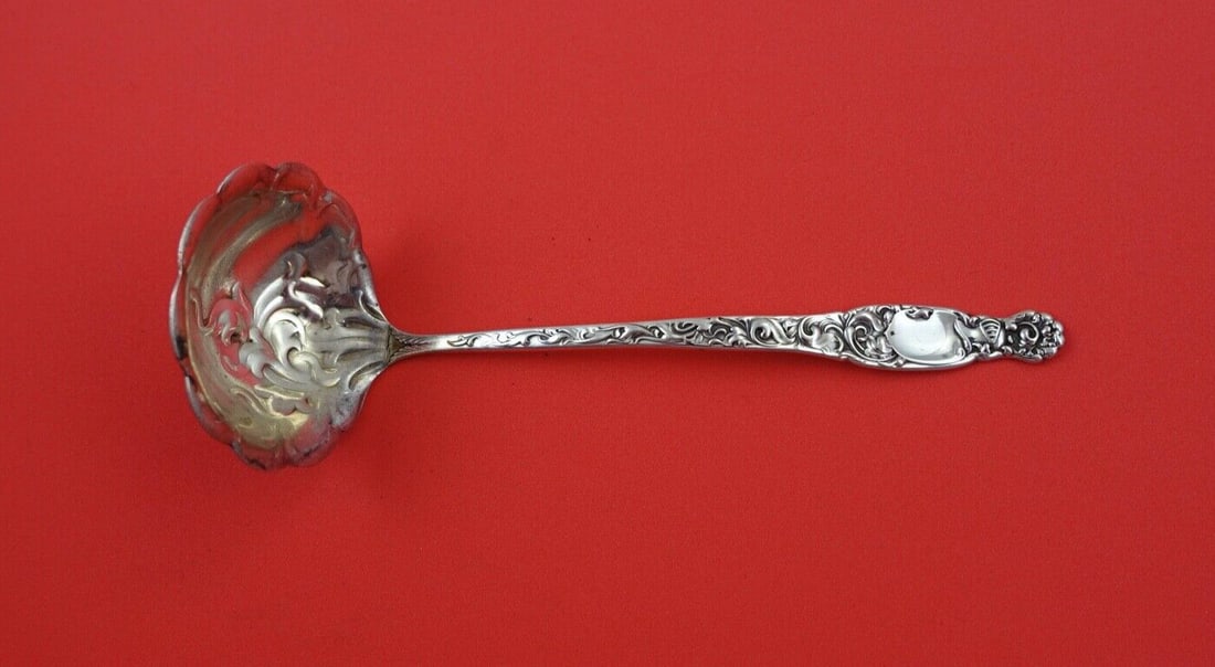 Whiting Heraldic Sterling Silver Sauce Ladle 6 Inch Design: Whiting Heraldic Sterling Silver Sauce Ladle 6 Inch Design This exquisite sauce ladle is crafted from high-quality sterling silver and features the elegant Heraldic pattern by Whiting. Measuring 6 inc