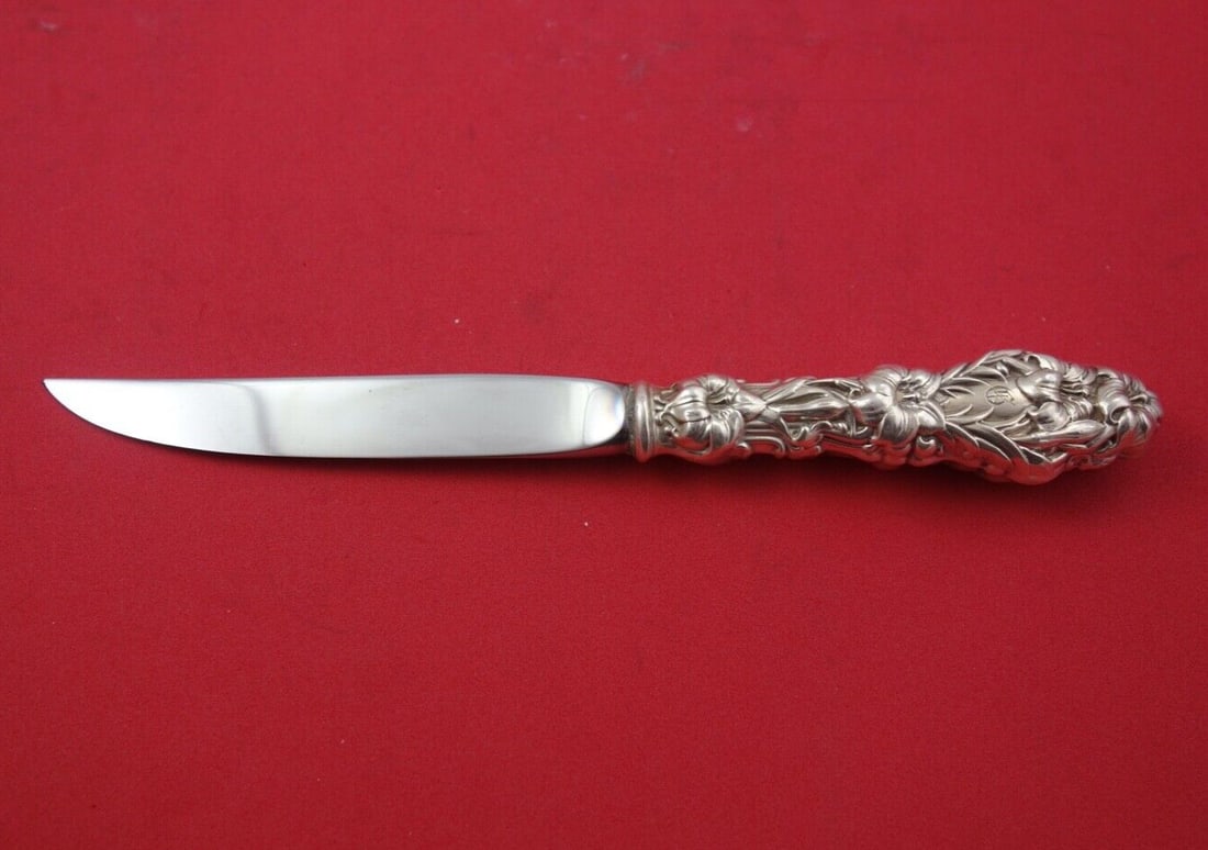 Whiting Lily Sterling Silver 8 Inch Steak Knife Fat Handle: Whiting Lily Sterling Silver 8 Inch Steak Knife Fat Handle This exquisite Sterling Silver Steak Knife features a fat handle and is part of the coveted "Lily" pattern by Whiting Manufacturing Company.