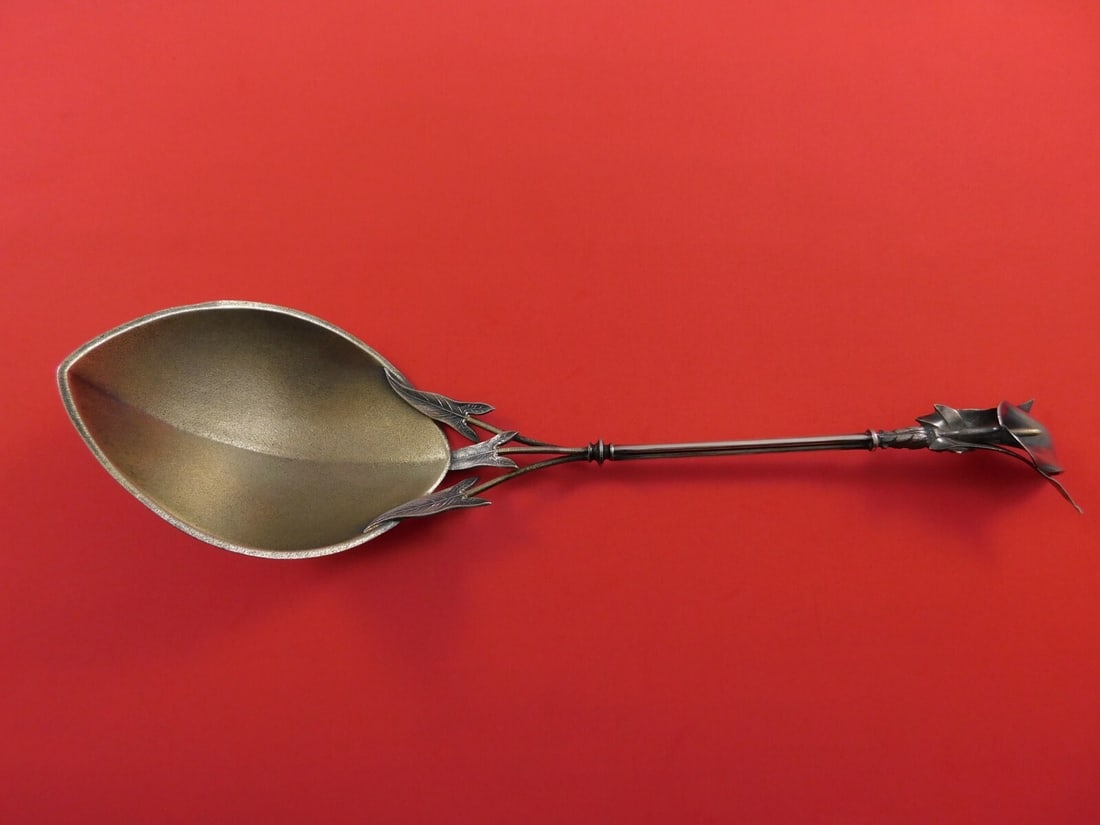 Whiting Calla Lily Sterling Silver Berry Spoon Goldwashed 10.5": Whiting Calla Lily Sterling Silver Berry Spoon Goldwashed 10.5" This exquisite Calla Lily berry spoon, crafted by Whiting, features a stunning goldwashed finish with stippled detailing. Measuring 10 1