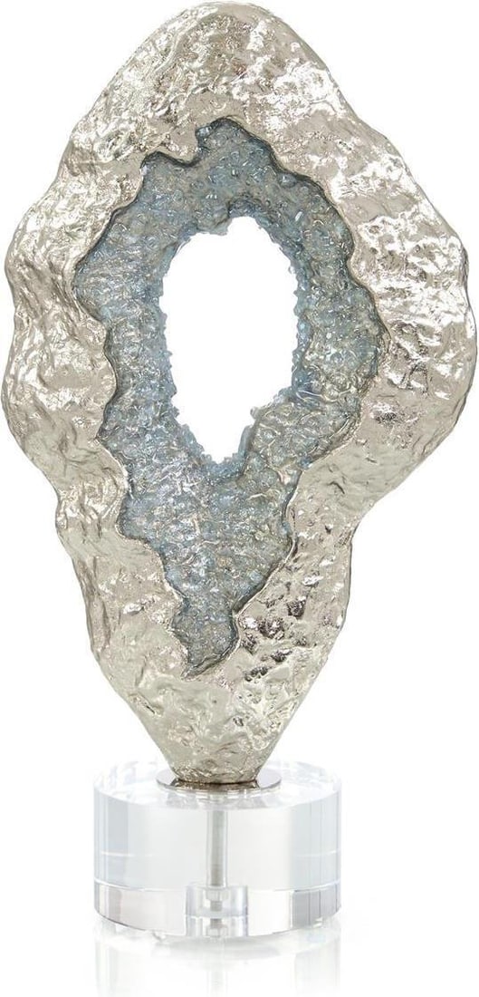 John-Richard Fluctuating Blue Geode Sculpture in Hammered Nickel: John-Richard Fluctuating Blue Geode Sculpture in Hammered Nickel This striking Fluctuating Blue Geode Sculpture features a unique hammered nickel finish that beautifully complements the vibrant blue g