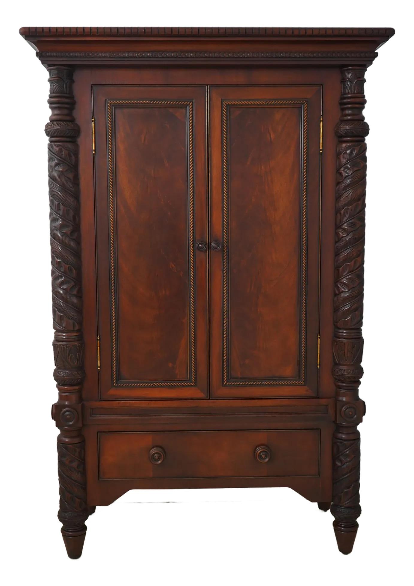 Ralph Lauren Safari Collection Mahogany Armoire 57" W x 26" D x 85" H: Ralph Lauren Safari Collection Mahogany Armoire 57" W x 26" D x 85" H Enhance your living space with this stunning Mahogany Armoire from the Ralph Lauren Safari Collection. Crafted by Henredon, this i