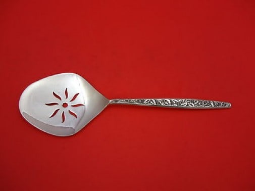Valencia International Sterling Silver Tomato Server 8.5 Inches: Valencia International Sterling Silver Tomato Server 8.5 Inches This exquisite tomato server is crafted from sterling silver and showcases the elegant Valencia pattern by International. Measuring 8 1/