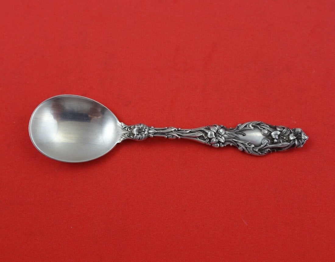 Whiting Sterling Silver 4" Lily Pattern Chocolate Spoon: Whiting Sterling Silver 4" Lily Pattern Chocolate Spoon This exquisite chocolate spoon is a classic piece from the Lily pattern by Whiting. Crafted from high-quality sterling silver (.925), this servi