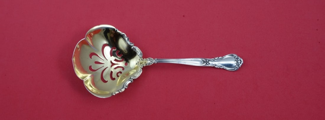 Gorham Chantilly Sterling Silver Confection Spoon 5.5" Applied Lacing: Gorham Chantilly Sterling Silver Confection Spoon 5.5" Applied Lacing Discover the elegance of the Chantilly pattern by Gorham with this exquisite sterling silver confection spoon. Measuring 5 1/2 inc