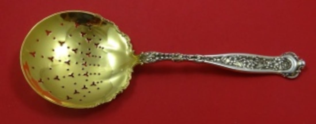 Whiting Dresden Sterling Silver Slotted Pea Spoon Gold Wash 8 3/4": Whiting Dresden Sterling Silver Slotted Pea Spoon Gold Wash 8 3/4" This exquisite slotted pea spoon, crafted by Whiting in the Dresden pattern, showcases the elegance of sterling silver with a gold wa