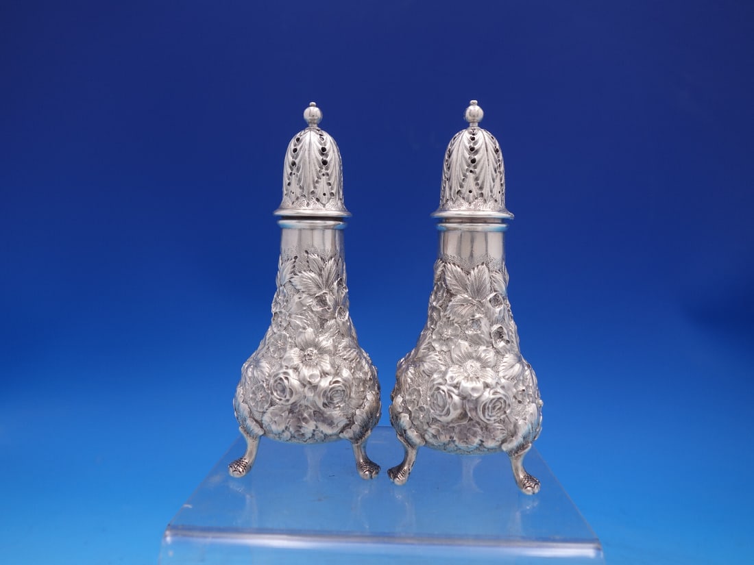Ritter & Sullivan 1903 Sterling Silver Repousse Salt and Pepper Shakers Pair: Ritter & Sullivan 1903 Sterling Silver Repousse Salt and Pepper Shakers Pair Elegant pair of Repousse salt and pepper shakers crafted by Ritter & Sullivan, showcasing intricate designs typical of the