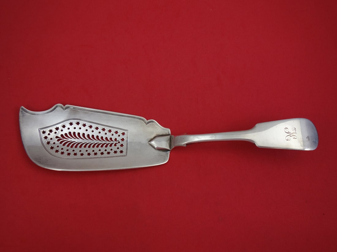 JH English Sterling Silver Fish Server 1829 Pierced Stars 11 5/8": JH English Sterling Silver Fish Server 1829 Pierced Stars 11 5/8" This exquisite fish server, crafted from sterling silver, hails from the renowned English Sterling pattern by JH, dating back to 1829.
