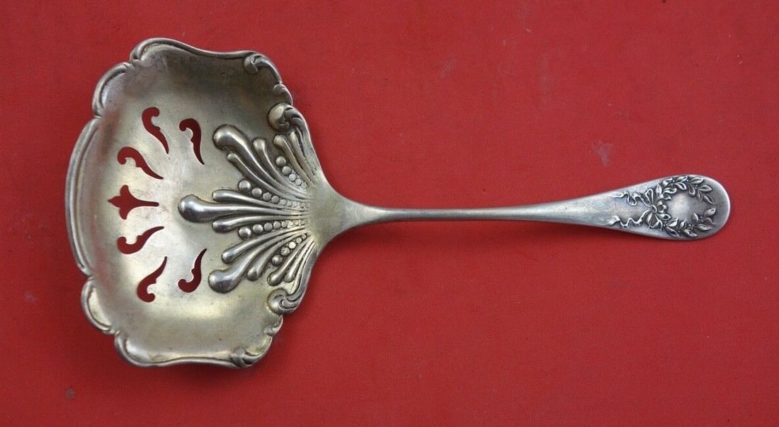 Shiebler Napoleon Sterling Silver 5 Inch Nut Spoon: Shiebler Napoleon Sterling Silver 5 Inch Nut Spoon This exquisite nut spoon from the Napoleon pattern by Shiebler is crafted from high-quality sterling silver. Measuring 5 inches, it features a classi