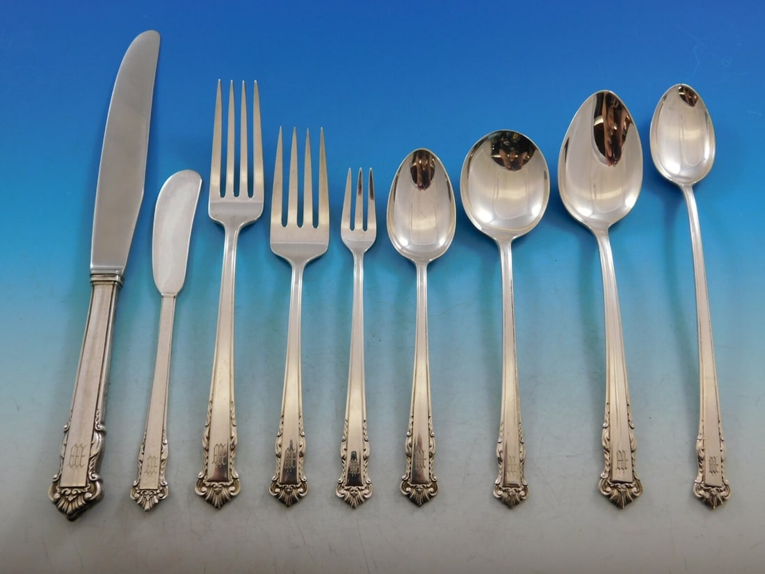 Lunt English Shell Sterling Silver Flatware Set 84 pcs Service for 8 with M Monogram: Lunt English Shell Sterling Silver Flatware Set 84 pcs Service for 8 with M Monogram Experience elegance with the English Shell flatware set by Lunt, a stunning collection comprising 84 pieces crafted