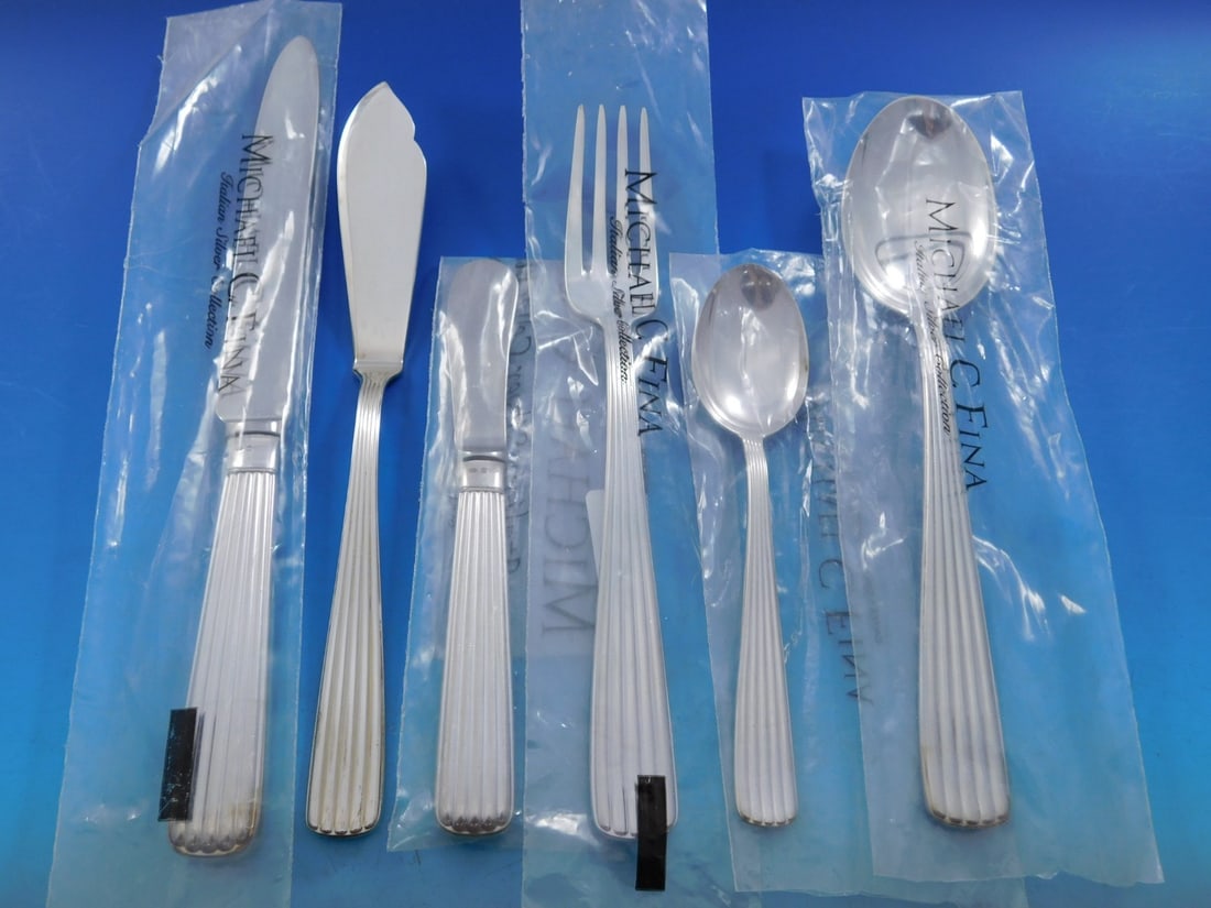 Schiavon America Sterling Silver Flatware Set 42 Pieces New: Schiavon America Sterling Silver Flatware Set 42 Pieces New Elevate your dining experience with the America Sterling Silver Flatware Set by Schiavon. This exquisite 42-piece set is crafted in Italy fr