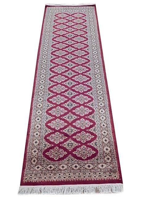 Handcrafted 2.8 x 8.1 Pinkish Red Jaldar Bokhara Wool Rug: Handcrafted 2.8 x 8.1 Pinkish Red Jaldar Bokhara Wool Rug Free continental US Shipping Enhance your home decor with this exquisite Pinkish Red Jaldar Handmade Bokhara Wool Rug, measuring 2' 8" x 8' 1"
