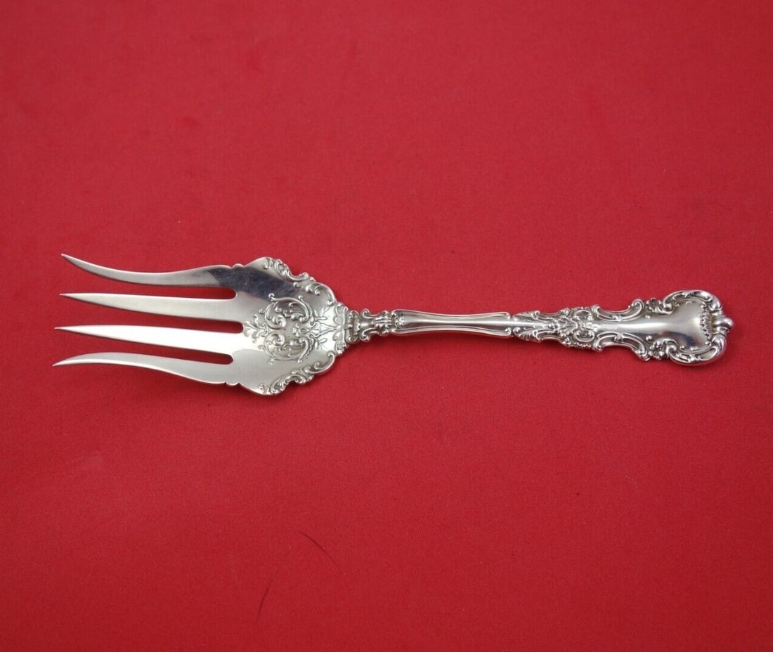 International Sterling Silver Avalon Serving Fork 6 3/4": International Sterling Silver Avalon Serving Fork 6 3/4" This Avalon serving fork by International Sterling is a stunning piece of heirloom silverware, measuring 6 3/4". Crafted from high-quality ster