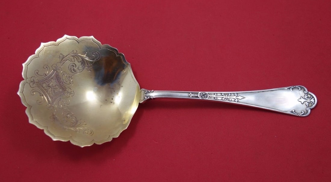 Puiforcat Fer de Lance Sterling Silver Pea Spoon Gold Washed 9 1/8": Puiforcat Fer de Lance Sterling Silver Pea Spoon Gold Washed 9 1/8" This exquisite pea spoon from Puiforcat features a stunning Fer de Lance design, crafted from high-quality sterling silver. The spoo