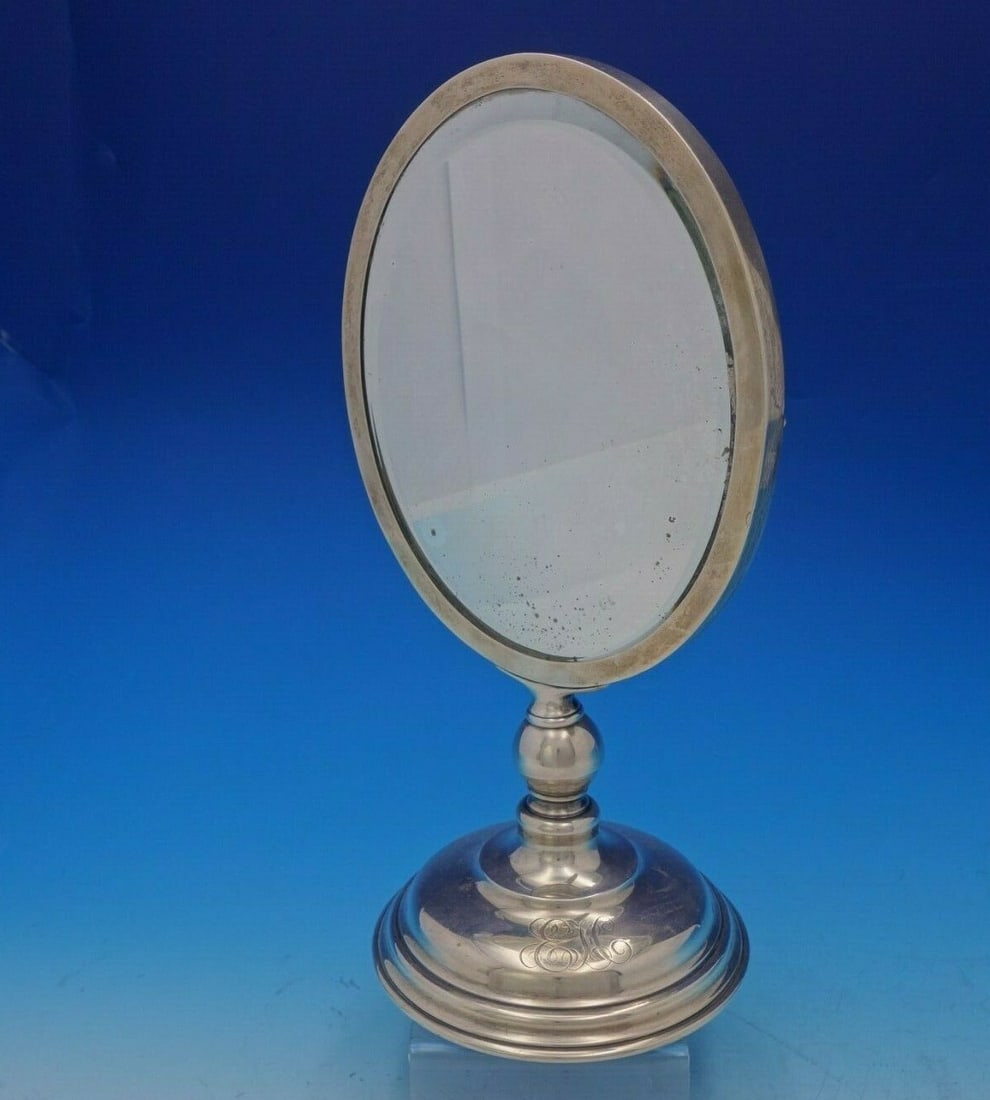 Lebkuecher & Co Sterling Silver Mirror on Adjustable Stand Circa 1896-1918: Lebkuecher & Co Sterling Silver Mirror on Adjustable Stand Circa 1896-1918 This exquisite mirror on stand by Lebkuecher & Co. showcases a beautiful composition of sterling silver, dating back to circa