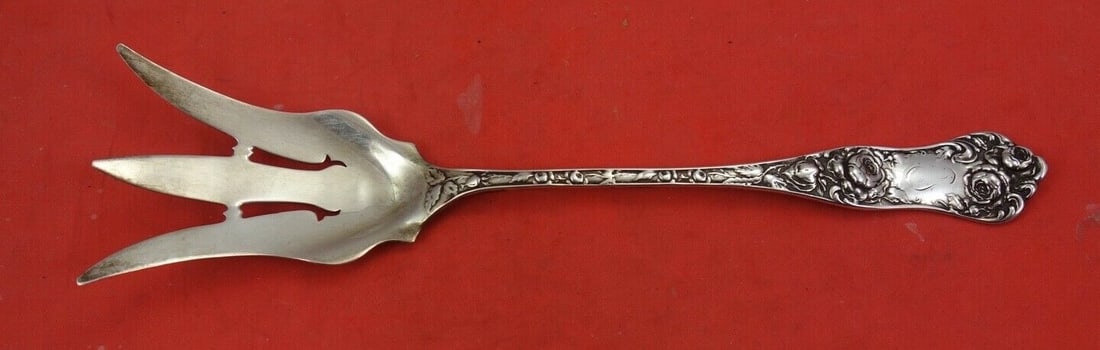 Shiebler American Beauty Sterling Silver Lettuce Fork 8 7/8": Shiebler American Beauty Sterling Silver Lettuce Fork 8 7/8" This exquisite large lettuce fork, measuring 8 7/8 inches, is crafted from sterling silver and features the elegant American Beauty pattern
