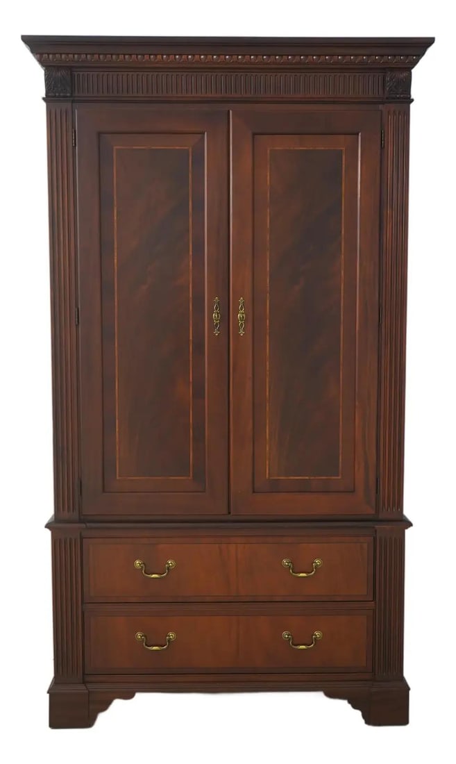 Chippendale Style Mahogany Armoire with Adjustable Shelf and Hanging Rod: Chippendale Style Mahogany Armoire with Adjustable Shelf and Hanging Rod This Ethan Allen bedroom armoire features a Chippendale-inspired 18th-century design crafted from quality figural mahogany. The