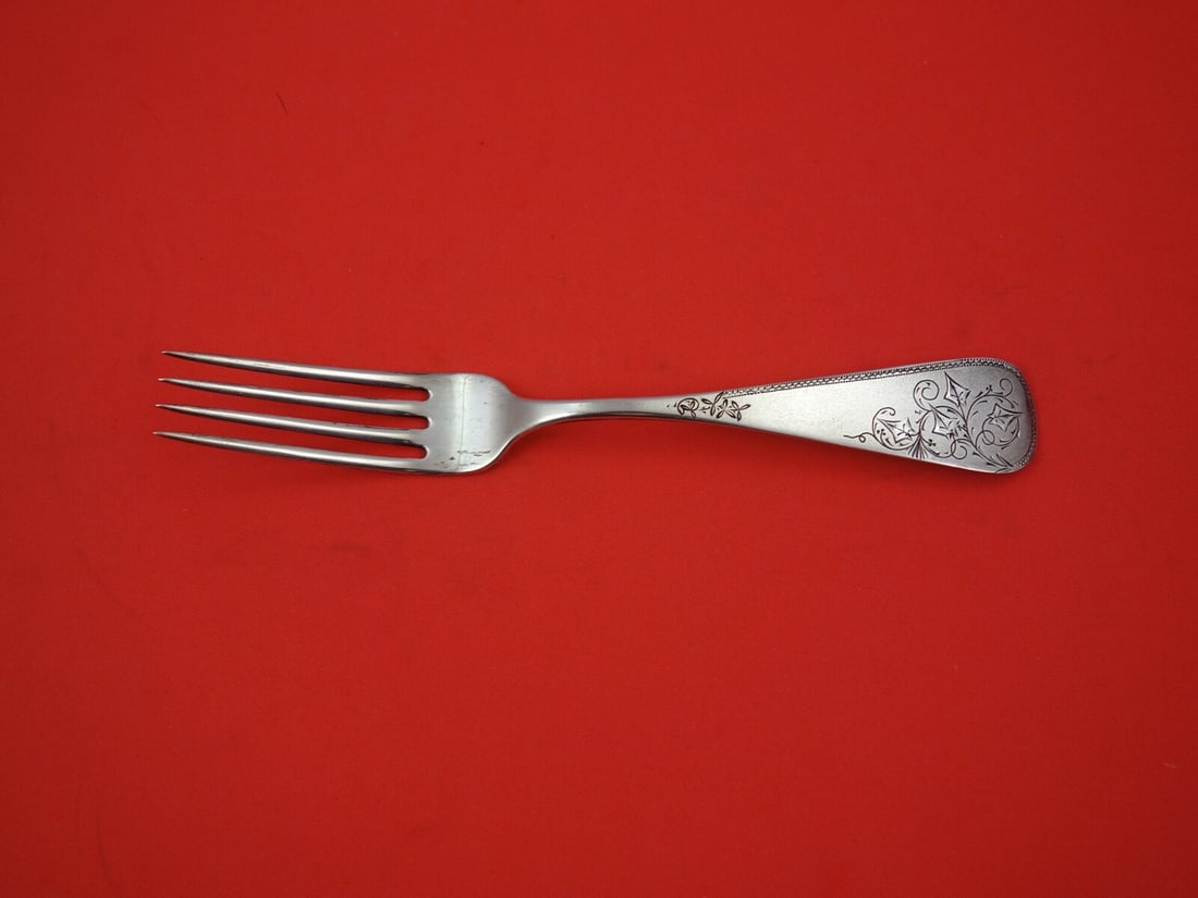 Duhme Sterling Silver Regular Fork 7.25 Inch Classic Design: Duhme Sterling Silver Regular Fork 7.25 Inch Classic Design This exquisite regular fork, crafted by Duhme, measures 7 1/4 inches in length and is made of high-quality sterling silver. The fork showcas
