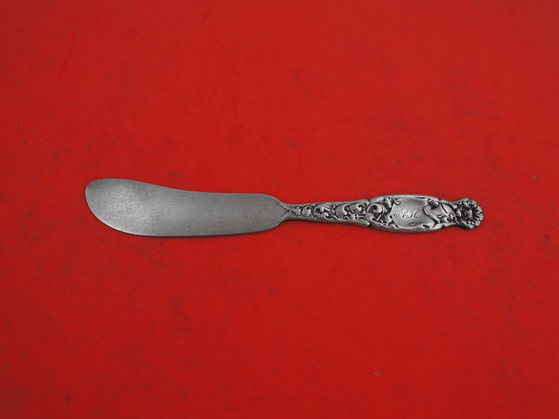 Whiting Heraldic Sterling Silver 7 Inch Master Butter Knife: Whiting Heraldic Sterling Silver 7 Inch Master Butter Knife This elegant 7" master butter knife features a flat handle design, crafted from high-quality sterling silver in the distinctive Heraldic pat