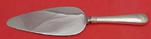 Durgin Sheaf of Wheat Sterling Silver Cake Server 10 inches: Durgin Sheaf of Wheat Sterling Silver Cake Server 10 inches Presenting the Sheaf of Wheat Cake Server, crafted by Durgin, a renowned name in sterling silver. This exquisite piece features a hollow han
