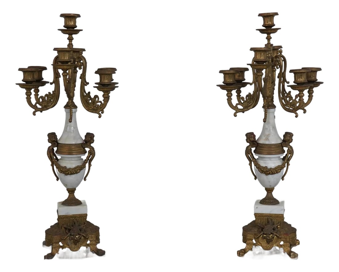 Vintage French Louis XV Candelabras with Marble and Brass Cherub Details: Vintage French Louis XV Candelabras with Marble and Brass Cherub Details This exquisite pair of French Louis XV vintage candelabras showcases fine carved details and features elegant white marble cent