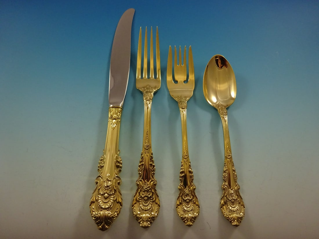 Wallace Sir Christopher Gold Vermeil Flatware Set 48 Pieces: Wallace Sir Christopher Gold Vermeil Flatware Set 48 Pieces Elevate your dining experience with the Sir Christopher Gold flatware service set by Wallace. This stunning post-1940 sterling silver set fe