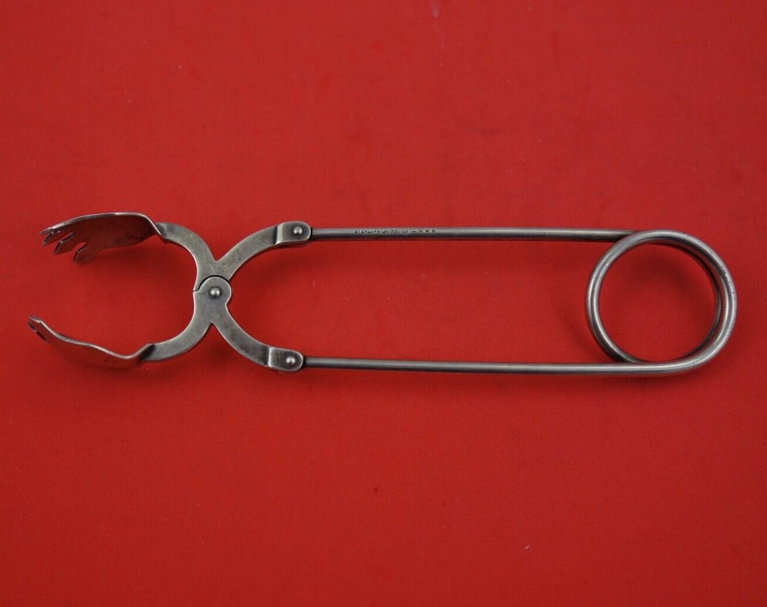 Blackinton Sterling Silver Mechanical Ice Tong 6.5 Inch: Blackinton Sterling Silver Mechanical Ice Tong 6.5 Inch This exquisite ice tong by Blackinton features a classic design crafted from high-quality sterling silver. Measuring 6 1/2 inches, this mechanic