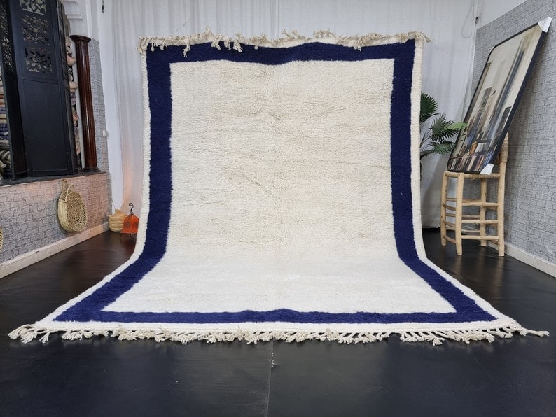 Authentic Handwoven Moroccan Checkered Rug 8 x 5 Feet: Authentic Handwoven Moroccan Checkered Rug 8 x 5 Feet Elevate your space with this stunning soft white and blue checkered rug, handcrafted in the Atlas Mountains of Morocco. Expertly woven by local Be