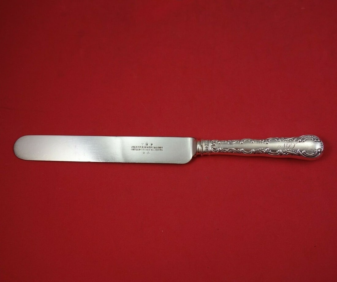 Rare 10 Inch Louis XV Sterling Silver Dinner Knife by Wood & Hughes: Rare 10 Inch Louis XV Sterling Silver Dinner Knife by Wood & Hughes Discover a rare and exquisite Louis XV dinner knife crafted by Wood & Hughes. This stunning piece features a hollow handle and a blu