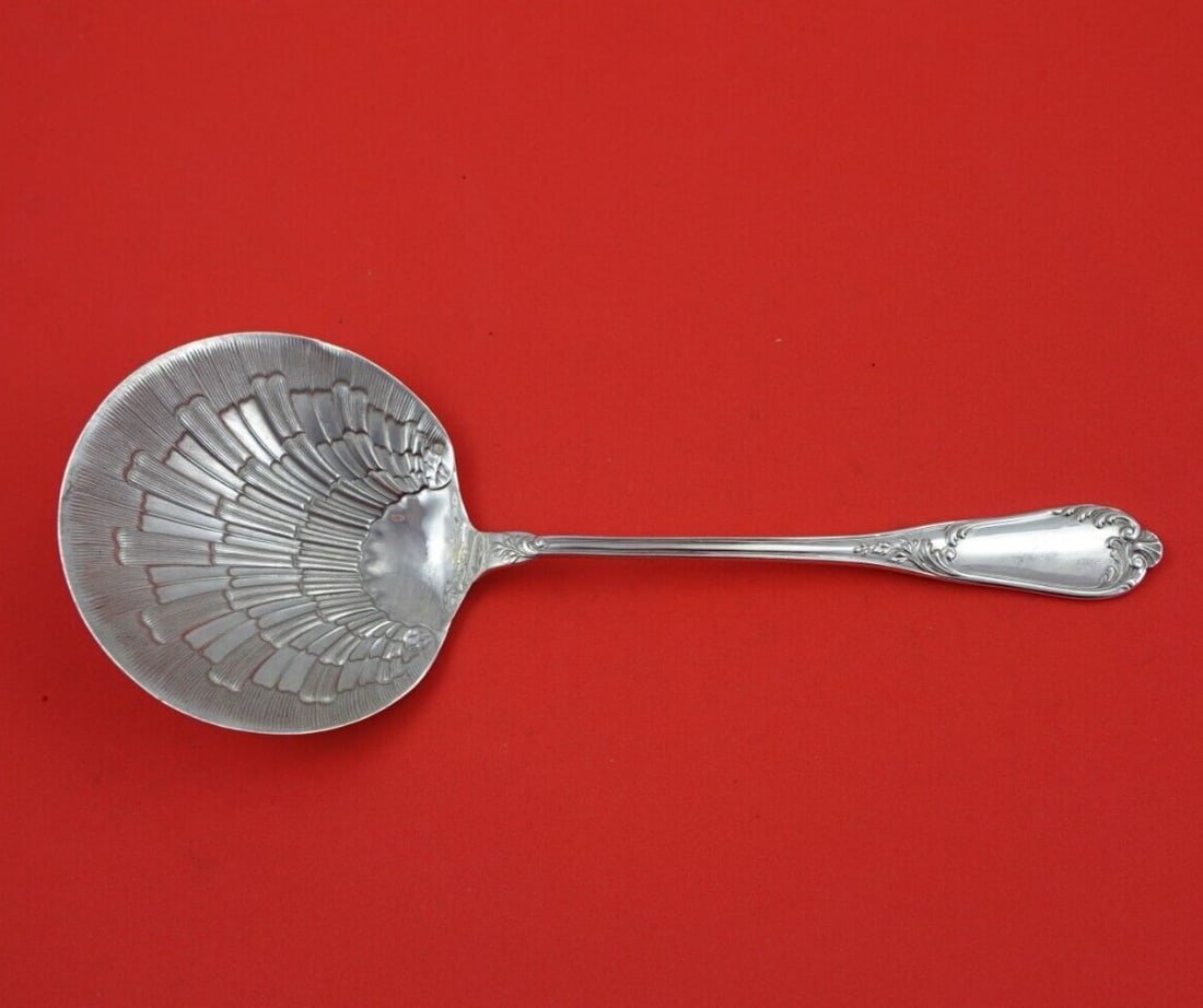 French .950 Silver Berry Spoon with Shell Bowl 8 3/4 Inch Serving Spoon: French .950 Silver Berry Spoon with Shell Bowl 8 3/4 Inch Serving Spoon This exquisite French .950 silver berry spoon features a beautifully crafted shell bowl, making it perfect for serving. Measurin