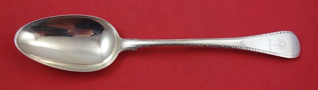 English Georgian Sterling Silver Dinner Spoon with Engraved Palm Tree 8 5/8 inch London 1814: English Georgian Sterling Silver Dinner Spoon with Engraved Palm Tree 8 5/8 inch London 1814 This exquisite English Georgian dinner spoon is crafted from sterling silver, showcasing elegant Georgian d