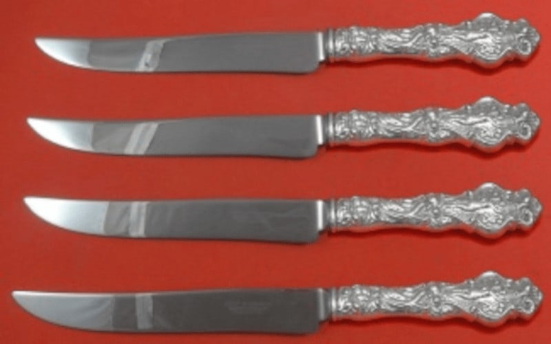 Wallace Irian Sterling Silver Steak Knife Set 4pc Custom Texas Size: Wallace Irian Sterling Silver Steak Knife Set 4pc Custom Texas Size Elevate your dining experience with this exquisite 4-piece steak knife set from the Irian pattern by Wallace. Crafted from sterling