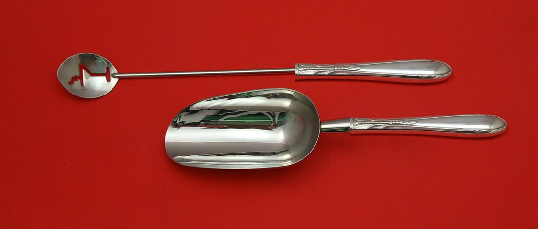 Oneida Heiress Sterling Silver 2pc Bar Set Martini Spoon Ice Scoop: Oneida Heiress Sterling Silver 2pc Bar Set Martini Spoon Ice Scoop This elegant 2-piece bar set by Heiress from Oneida is crafted from high-quality sterling silver, featuring a custom-made hollow hand