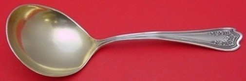 SSMC-Saart Blossom Sterling Silver Goldwashed Berry Spoon 8 1/8": SSMC-Saart Blossom Sterling Silver Goldwashed Berry Spoon 8 1/8" This exquisite serving spoon from the Blossom pattern by SSMC-Saart features a beautiful goldwashed finish. Crafted from high-quality s