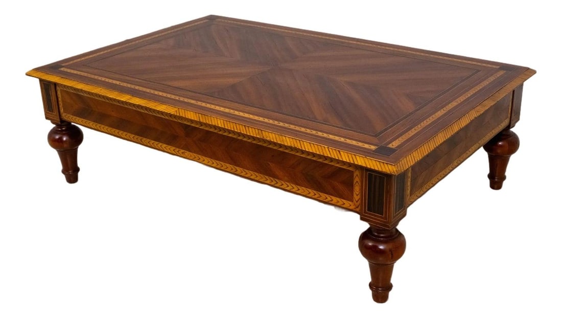 Alfonso Marina Ebanista Inlaid Coffee Table with Chevron Design: Alfonso Marina Ebanista Inlaid Coffee Table with Chevron Design This elegant Alfonso Marina Ebanista coffee table, crafted around 2001, showcases high-quality construction with fine carved details and