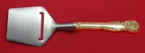 Reed and Barton La Reine Sterling Silver Cheese Plane 8 1/4 Custom Handle: Reed and Barton La Reine Sterling Silver Cheese Plane 8 1/4 Custom Handle This exquisite cheese plane is a part of the La Reine pattern by Reed & Barton, crafted from high-quality sterling silver. Des