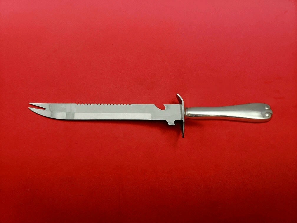Tiffany & Co Flemish Sterling Silver Ham Slice Knife Custom Made 11 1/2": Tiffany & Co Flemish Sterling Silver Ham Slice Knife Custom Made 11 1/2" Introducing a stunning ham slice crafted by Tiffany & Co. This exquisite piece features a hollow handle made of sterling silver
