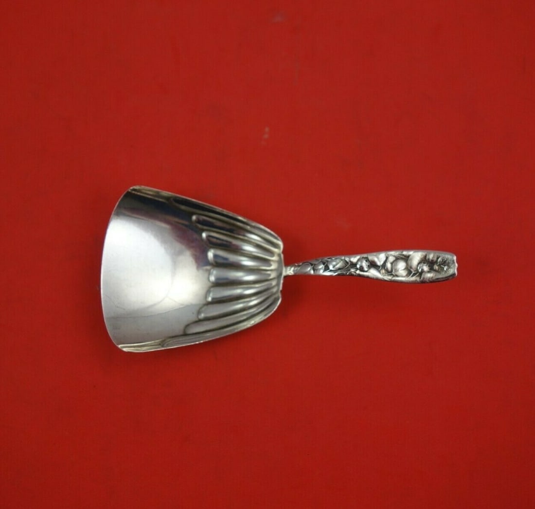 Whiting Berry Sterling Silver Almond Scoop 4 1/4" Partridgeberry Motif: Whiting Berry Sterling Silver Almond Scoop 4 1/4" Partridgeberry Motif This exquisite serving piece from the Berry pattern by Whiting features a beautifully designed almond scoop with a charming partr