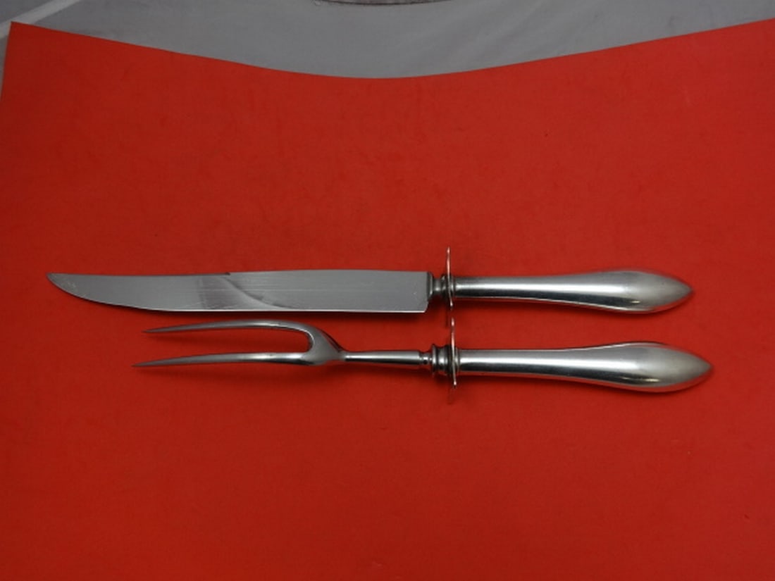 Watson John Adams Sterling Silver 2pc Carving Set 14in: Watson John Adams Sterling Silver 2pc Carving Set 14in This exquisite John Adams roast carving set by Watson features a classic design crafted from high-quality sterling silver. The two-piece set incl