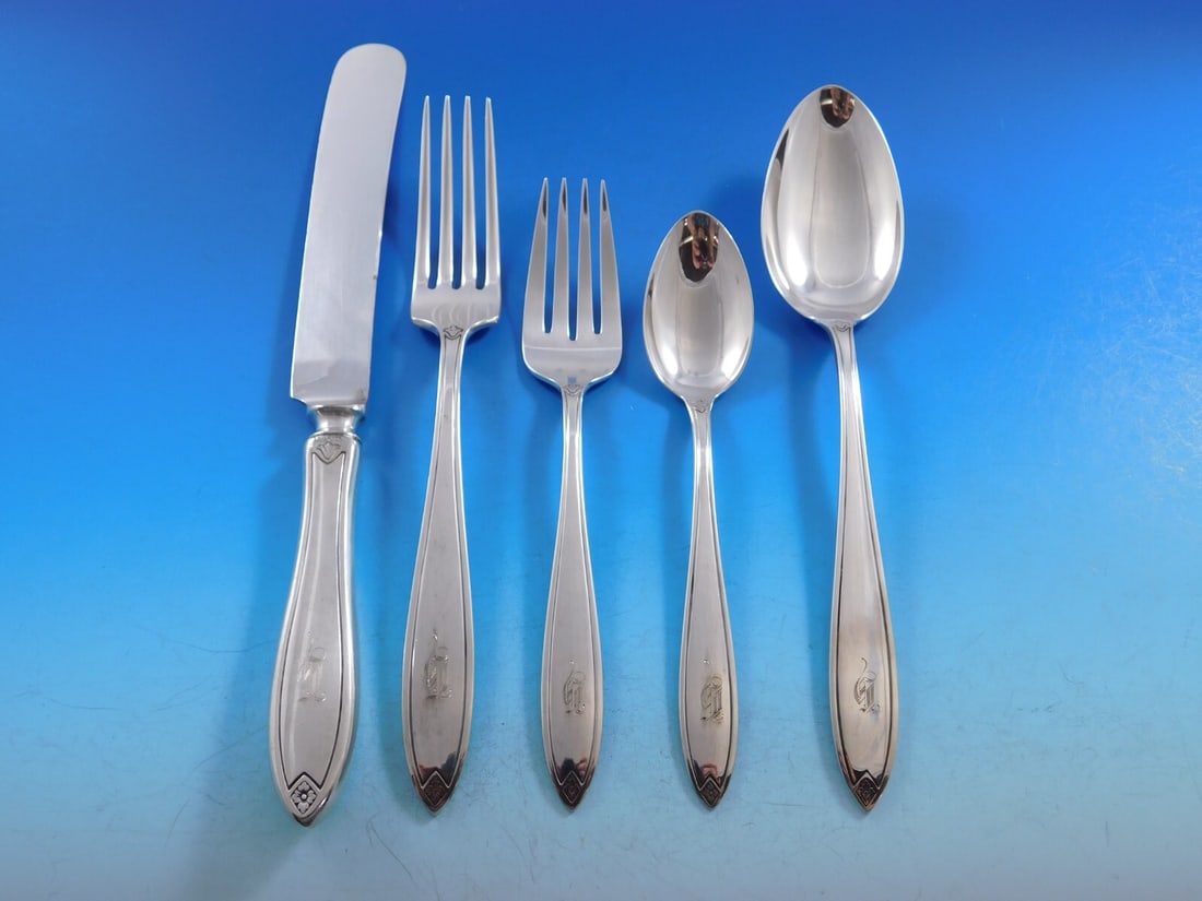Hallmark Fiesta Sterling Silver Flatware Set 73 Pieces G Monogram: Hallmark Fiesta Sterling Silver Flatware Set 73 Pieces G Monogram This exquisite Fiesta by Hallmark Sterling Silver Flatware Set comprises 73 pieces, featuring a graceful 'G' monogram. The collection